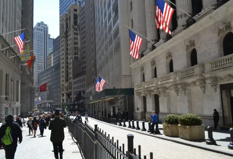 american road with building and usa flag